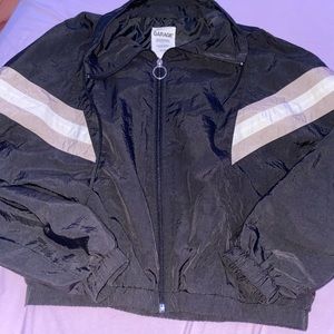 Black, pink, and white windbreaker jacket